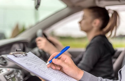 driving instructor teaching driving lesson in gloucester