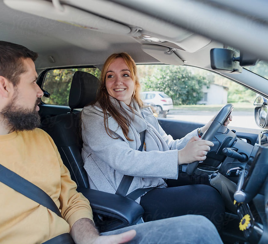 women is smiling on passing driving lesson successfully women is smiling on passing driving lesson in Gloucester